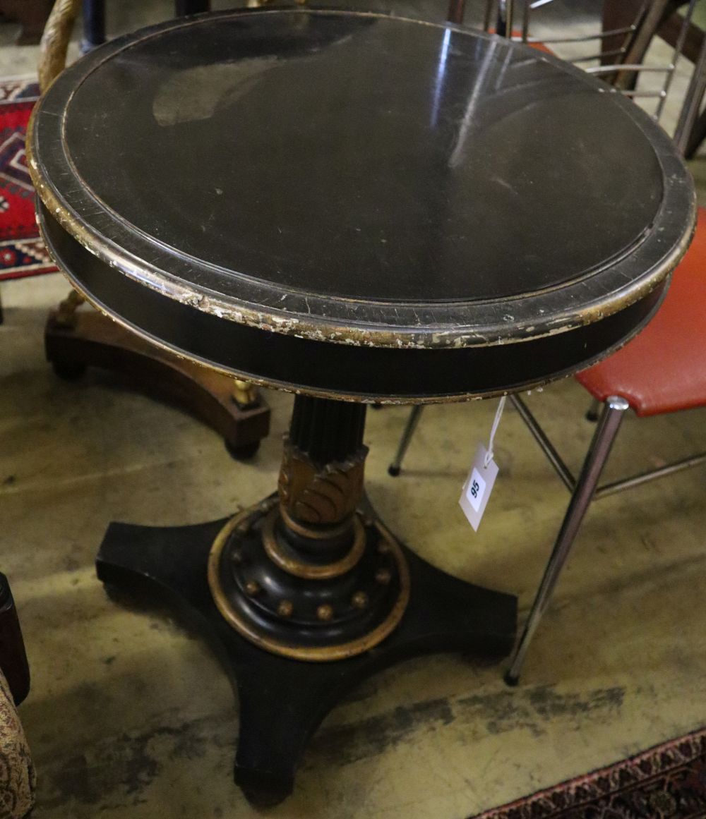 An early Victorian gilt ebonised circular slate top table, 55cm diameter, height 70cm